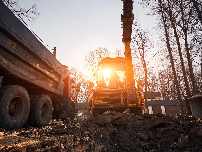 Professional excavator performing foundation excavation for residential construction in El Dorado County